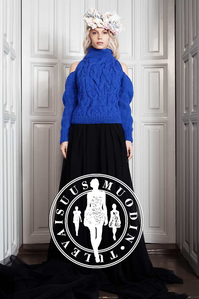 Olkaimeton Astrid-neule on oivallinen asuvalinta tilanteeseen, jossa ulkona on kylmä mutta sisällä vähän kuuma.