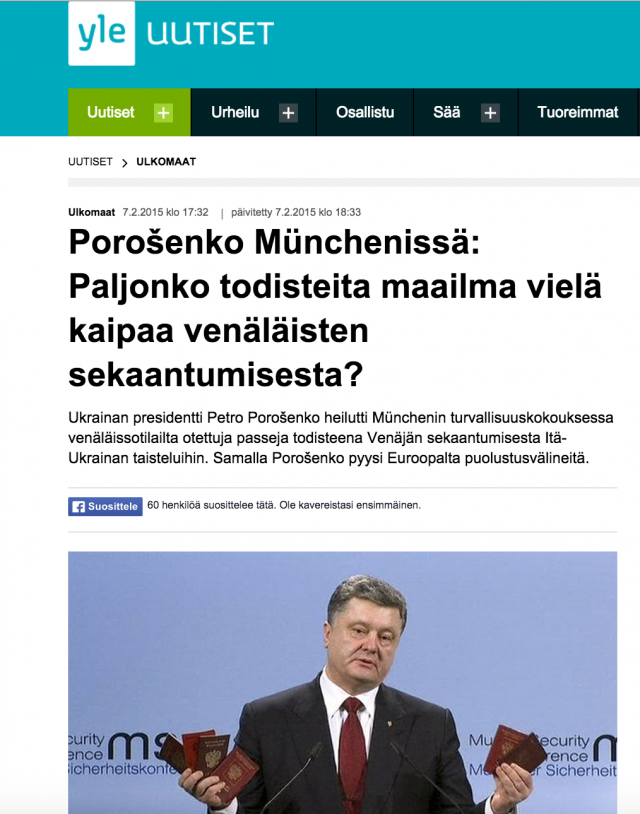 Yle nosti esiin suoraan Reutersin uutisen. Kuvakaappauksessa Ukrainan presidentti Petro Porošenko pitää kädessään venäläisiä passeja.
